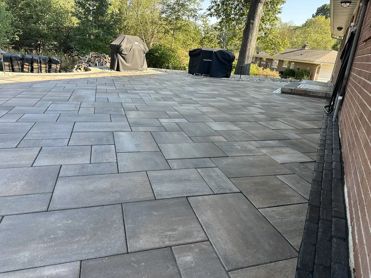 Cleaned and sealed herringbone paver patio