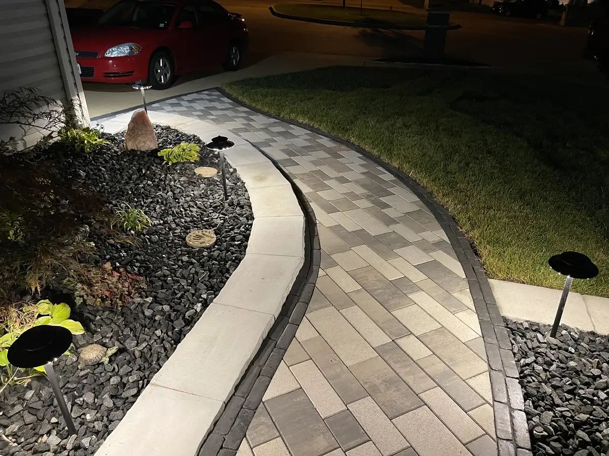 Curved paver walkway with sealed joints