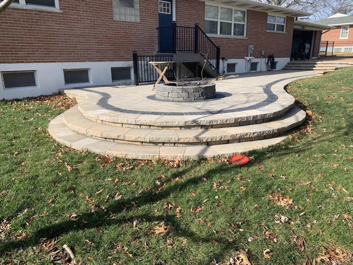 Paver patio with pergola and fire pit in St. Louis